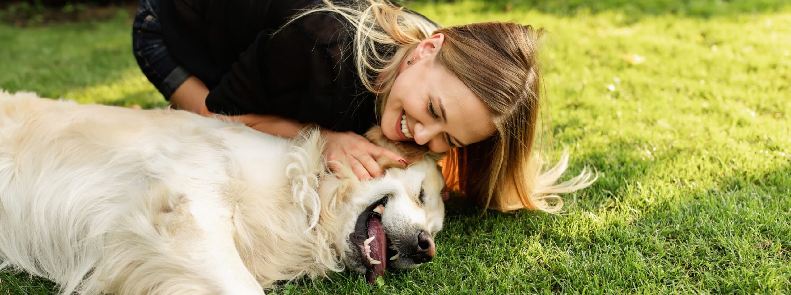 woman petting a dog